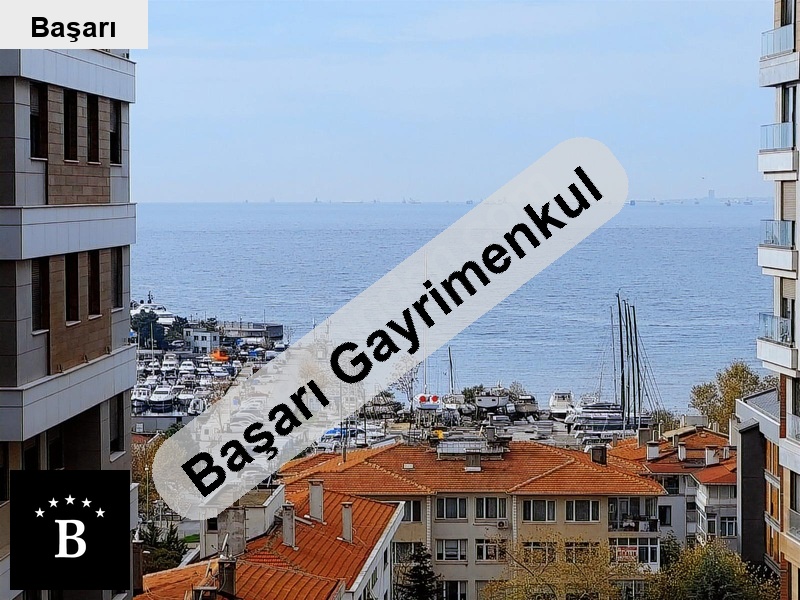 Başarı'dan kalamış sahilde deniz manzaralı 95m2 2+1 lüks boş daire