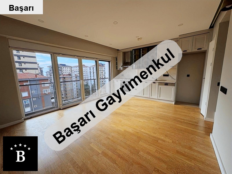 Başarı'dan   sahil de ara kat dubleks satılık 1+1 daire