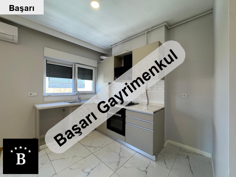 Başarı'dan  sahıl parselinde ara kat 1+1 i̇skanlı genç binada