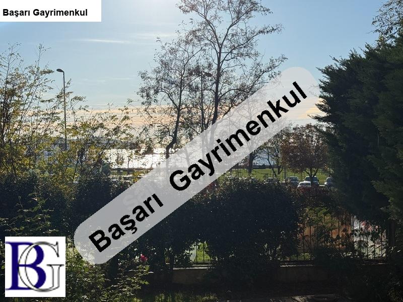 Başarı'dan &ccedil;atal&ccedil;eşme sahil bandın'da  deni̇z manzarali bah&ccedil;eli̇ yali dai̇resi̇