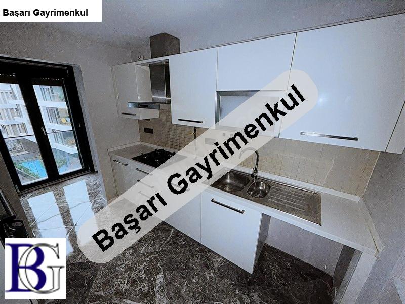 Başarı'dan KALAMIŞ'DA 7 / 24 G&Uuml;VENLİKLİ 120M2 GENİŞ 2+1
