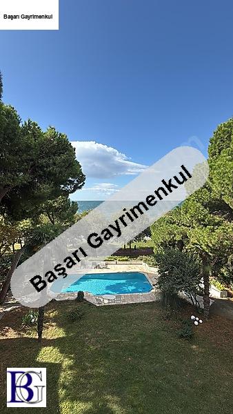 Başarı'dan yol yalısı lebiderya deniz ve doğa manzaralı  caddebostan sahilde lüks yalı dairesi geniş cephe, havuz, bahçe