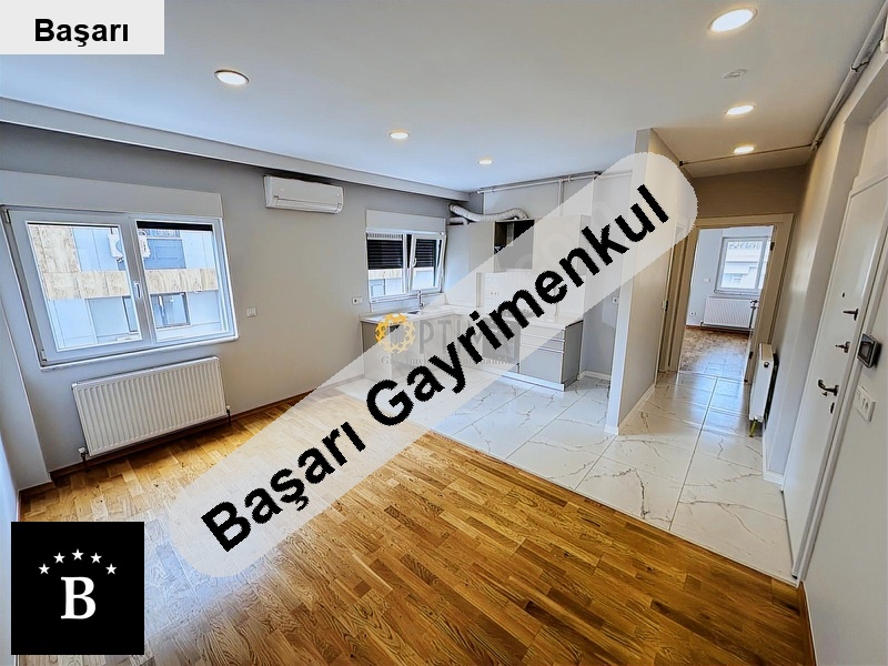 Başarı'dan  sahi̇lde yeni̇ bi̇nada ebeyn banyolu 1+1
