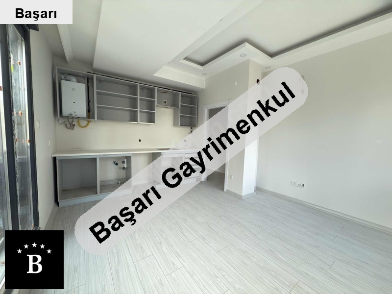 Başarı'dan suadi̇ye mi̇ni̇büs si̇ üzeri̇nde yeni̇ bi̇nada satilik 2+1 dai̇re